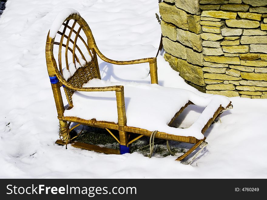 Sledges on to snow in a winter garden