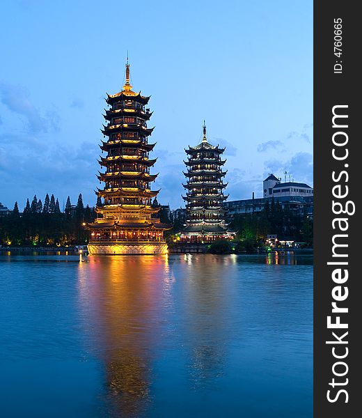 Banyan Lake Pagodas, Guilin, China ,one represents the sun, the other the moon. Banyan Lake Pagodas, Guilin, China ,one represents the sun, the other the moon