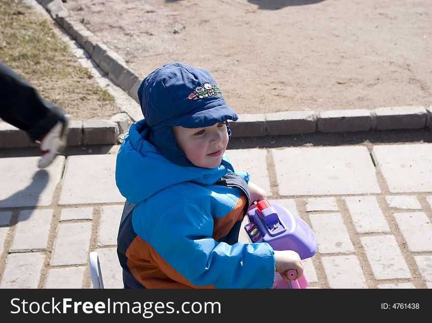 Little boy on the tricycle. Moscow. Spring 2008. Little boy on the tricycle. Moscow. Spring 2008.