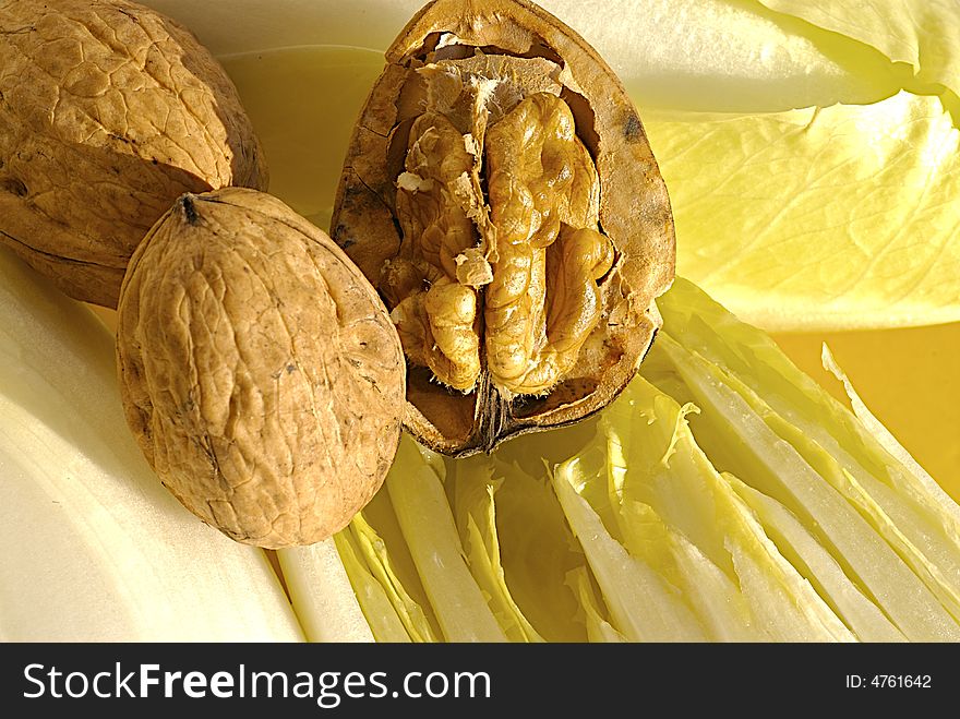 Fresh endive leaves and walnuts. Fresh endive leaves and walnuts