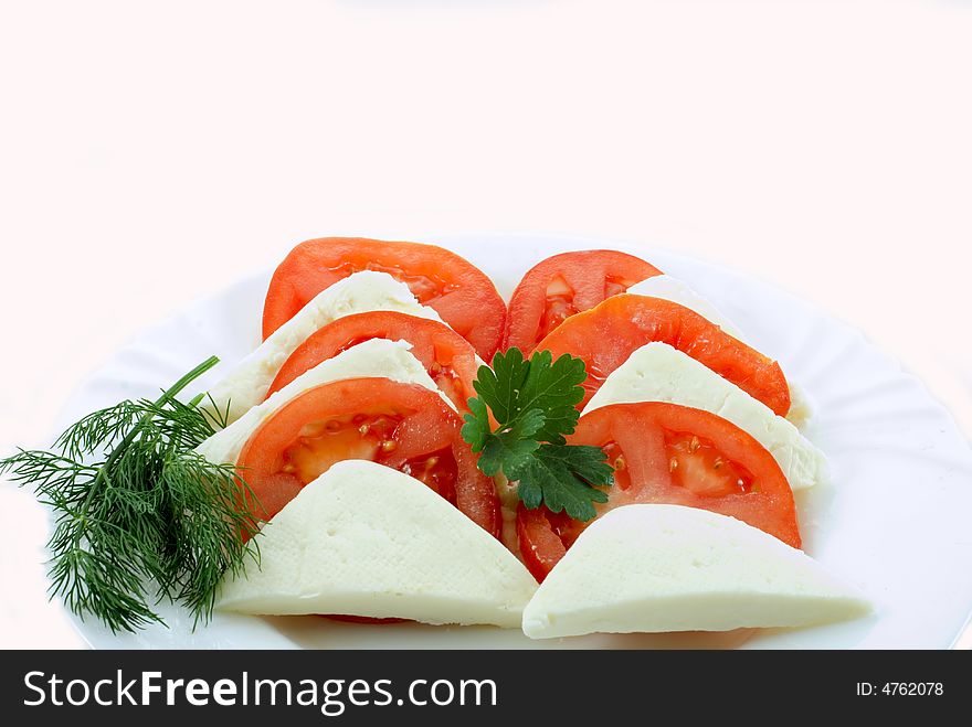 Tomato and slice on white background. Tomato and slice on white background