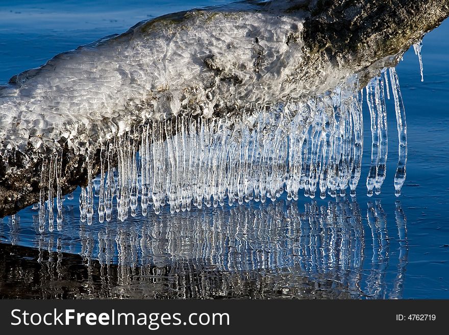 Icicles on a lake