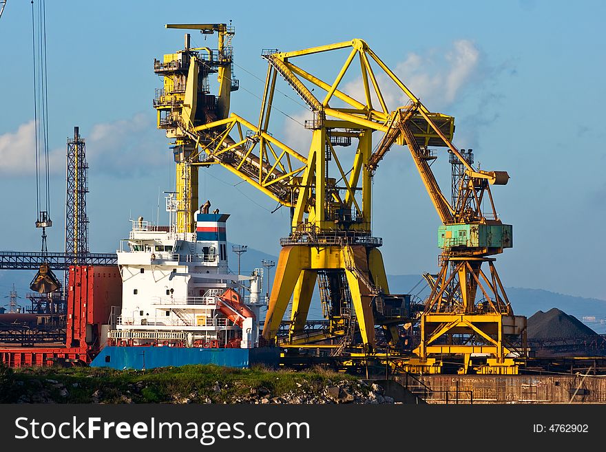 Crane in Piombino harbor, Tuscany, Italy. Crane in Piombino harbor, Tuscany, Italy.