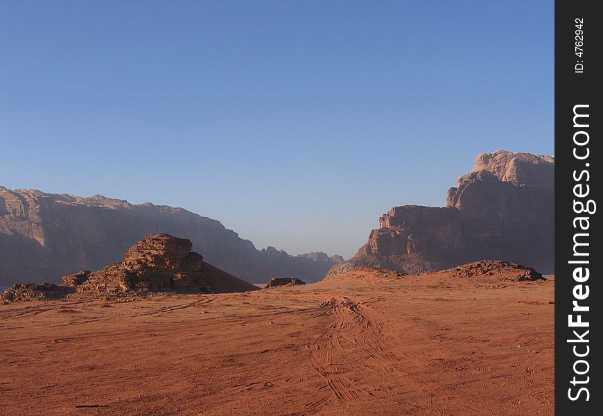 Desert with red rocks and red sand, Wadi Rum, Jordan. Desert with red rocks and red sand, Wadi Rum, Jordan