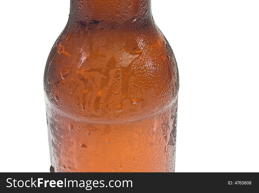 Close-up of the shoulder of a ice cold bottle of beer, isolated against white. Close-up of the shoulder of a ice cold bottle of beer, isolated against white.