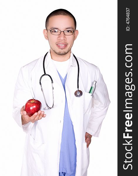 Medical doctor offering a red apple. Medical doctor offering a red apple