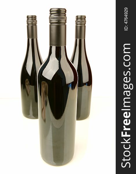 Bottles of wine isolated against a white background