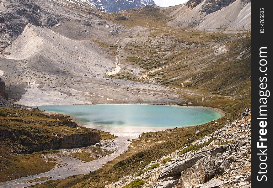 Very beautiful landscape.white snow mountaintop under the blue sky.altitude about 5100 meter.south of sichuan provence,china. Very beautiful landscape.white snow mountaintop under the blue sky.altitude about 5100 meter.south of sichuan provence,china.