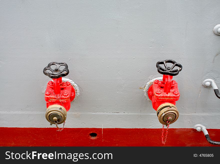 Firefighting taps at a military ship