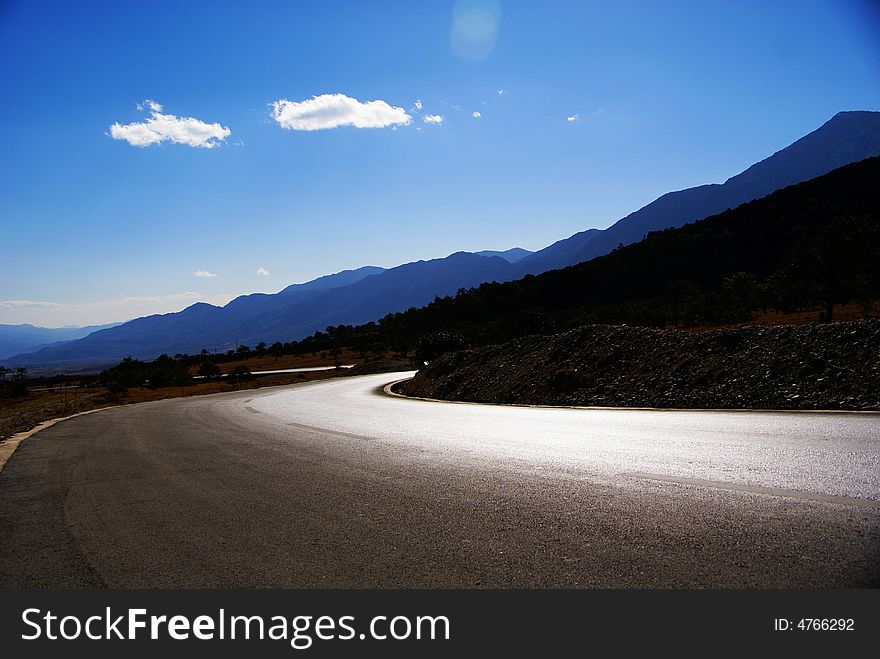 Road down to the Yulong Snow Mountain. Road down to the Yulong Snow Mountain