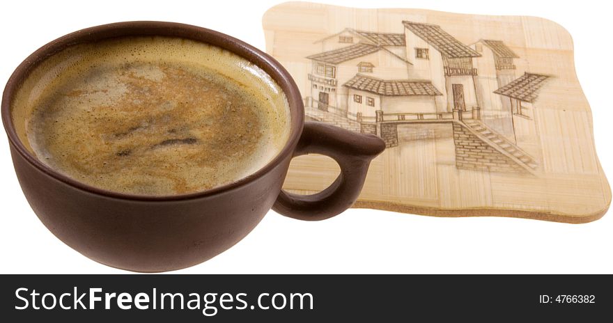 A cup of coffee and the wood with picture. A cup of coffee and the wood with picture