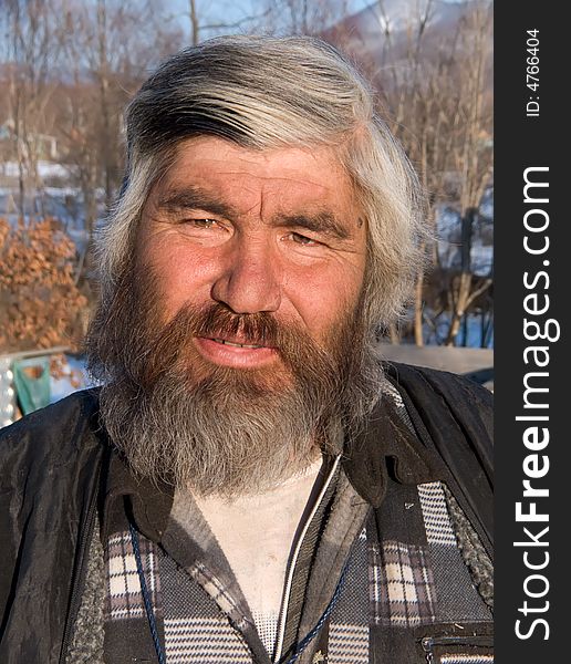 A portrait close-up of the men, the representative of one of small indigenous peoples of Russian Far East. His name is Valery Eusan. Primorsky Region, settlement Preobrazhenie. A portrait close-up of the men, the representative of one of small indigenous peoples of Russian Far East. His name is Valery Eusan. Primorsky Region, settlement Preobrazhenie.