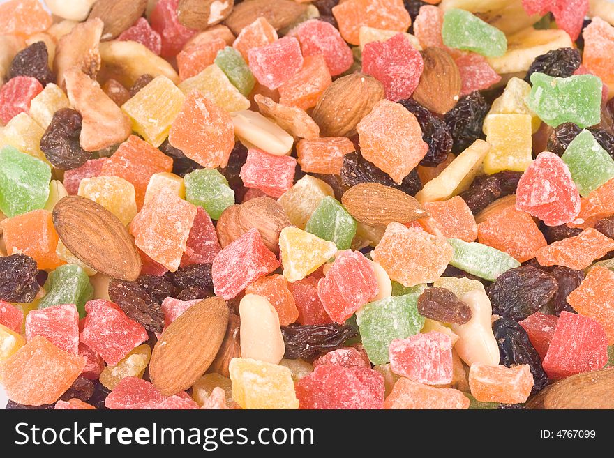 Background from assorted dried fruits and nuts. Close-up.