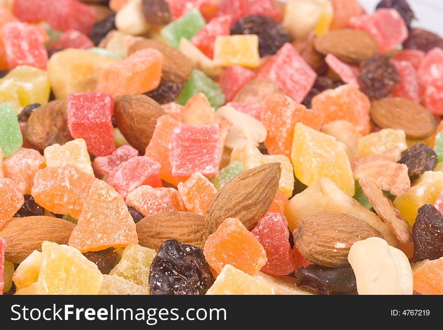 Background from assorted dried fruits and nuts. Close-up.