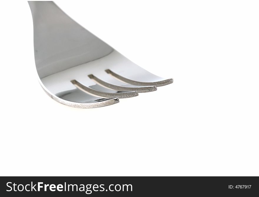 Stainless fork close up isolated on white