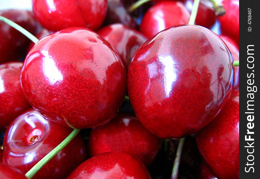 Sweet, wet red cherries background