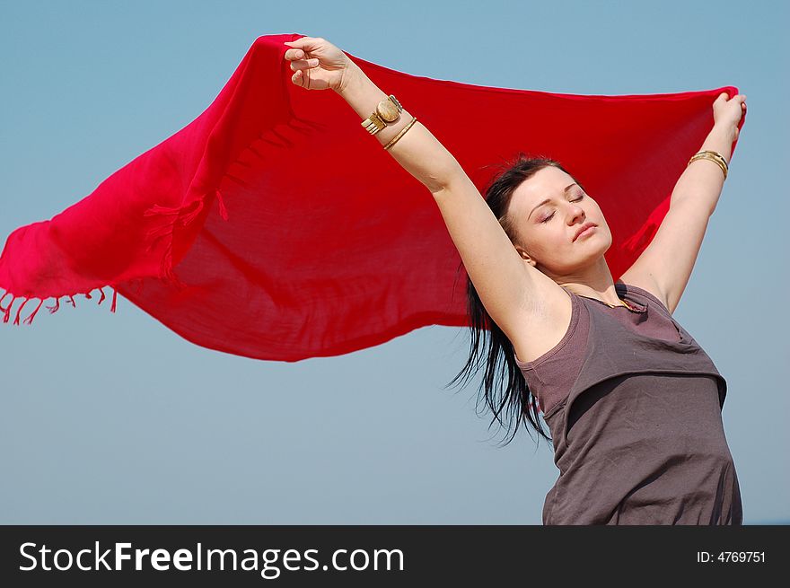 Freedom attractive brunette woman on the sunny beach. Freedom attractive brunette woman on the sunny beach