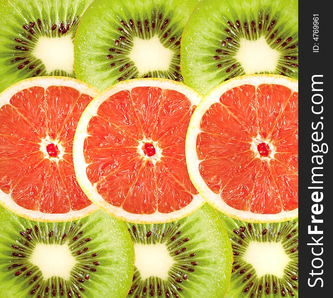 Appetizing fruity background from kiwi and grapefruit. Appetizing fruity background from kiwi and grapefruit