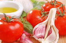 Garlic, Tomatoes And Basil. Royalty Free Stock Photography Garlic, Tomatoes And Basil. Royalty Free Stock Photography