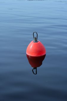 Plastic Buoy On The Blue Water Stock Photography