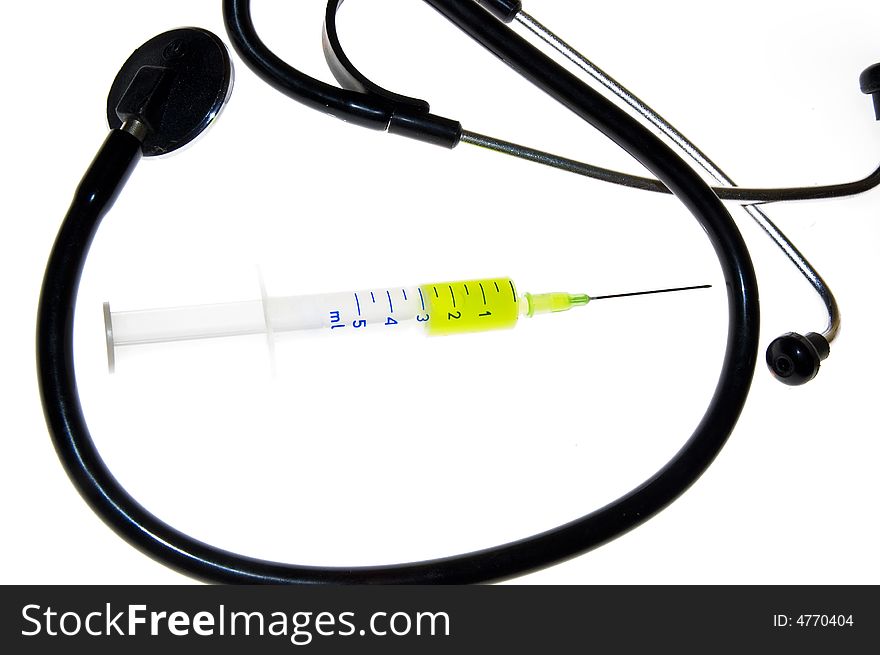 Stethoscope and syringe isolated over white background