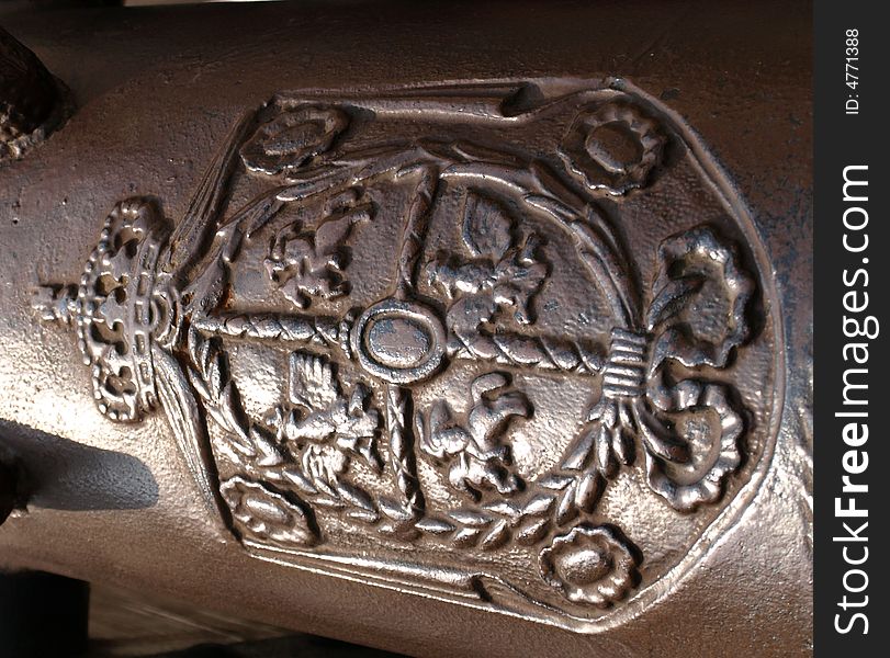 The polish histiric emblem on old cannon. The polish histiric emblem on old cannon.