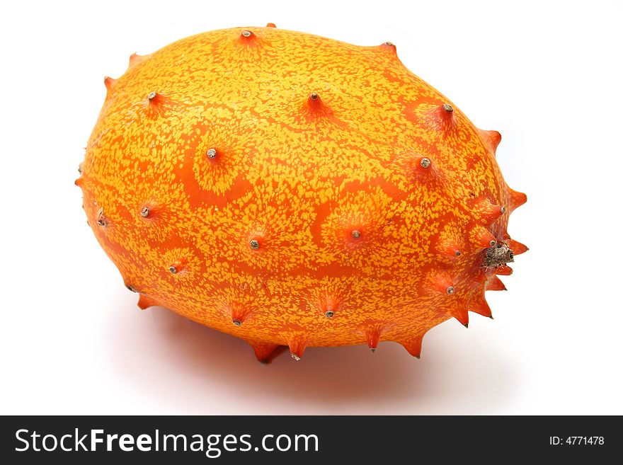 Kiwano or African horned melon sliced open over white. Also known as hedged gourd, African Horned Cucumber, English tomato.