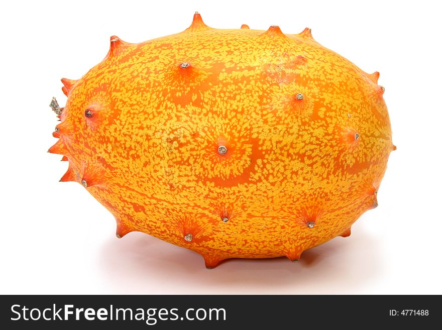 Kiwano or African horned melon sliced open over white. Also known as hedged gourd, African Horned Cucumber, English tomato.