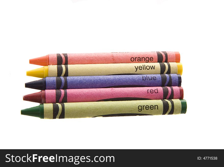 Five colored crayons on a white background. Five colored crayons on a white background