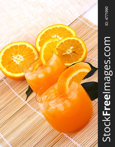 Orange and orange juice in a glass