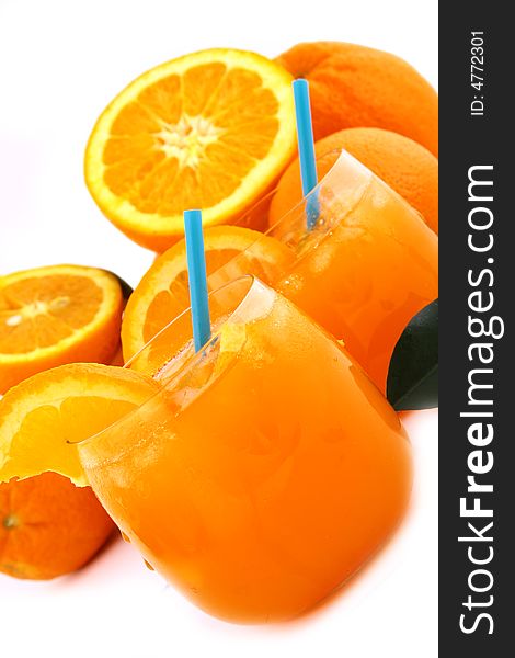 Orange and orange juice in a glass