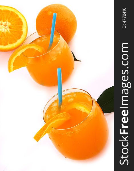 Orange and orange juice in a glass