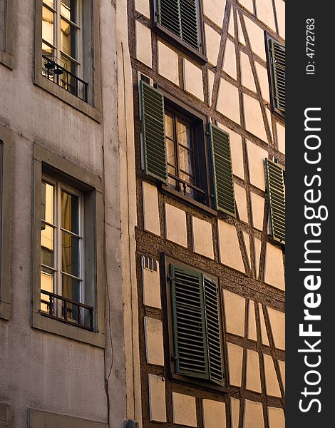 Historical Half Timbered facade under golden glow of sunset in Strasbourg. Historical Half Timbered facade under golden glow of sunset in Strasbourg.