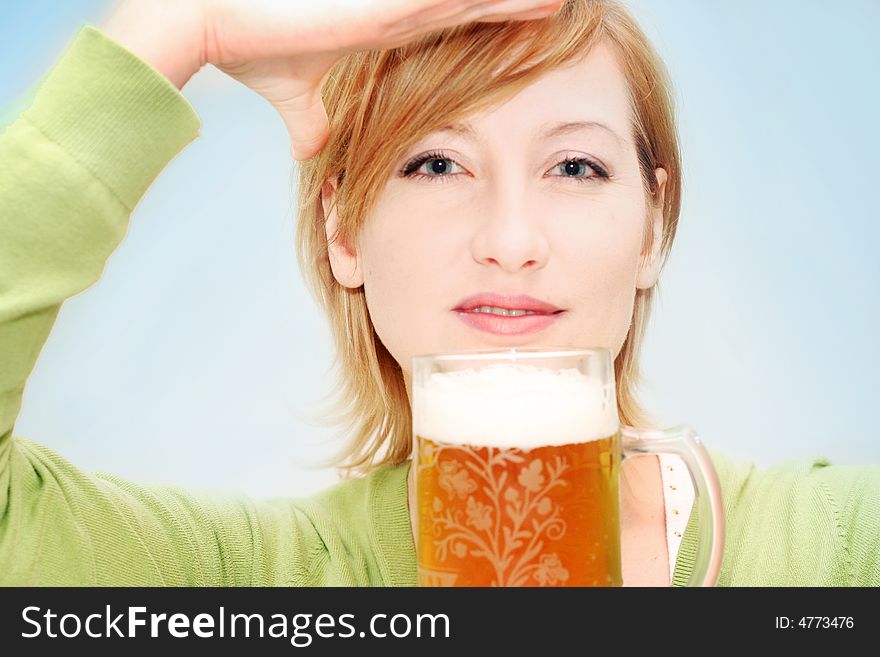 Young woman with a big glass beer. Young woman with a big glass beer