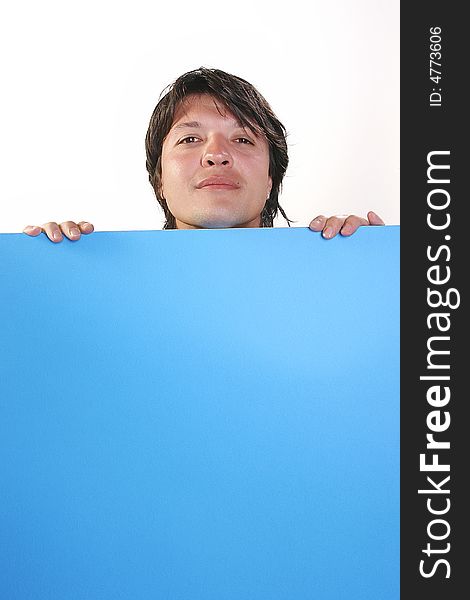 Young man holding blue billboard. Young man holding blue billboard
