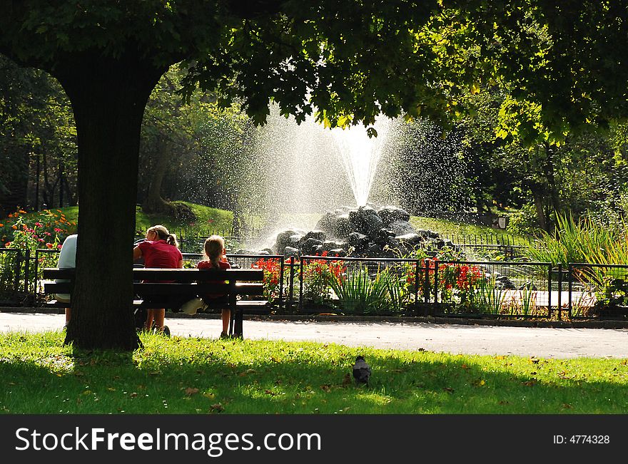 Afternoon in the park where peple like to relax in sunny and warm day. Afternoon in the park where peple like to relax in sunny and warm day.