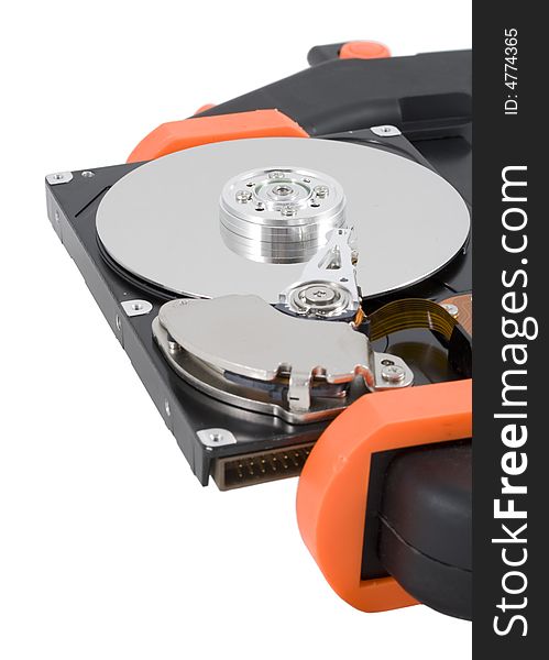 The computer hard disk clamped in a manual clamp isolated on a white background. Clipping path included.