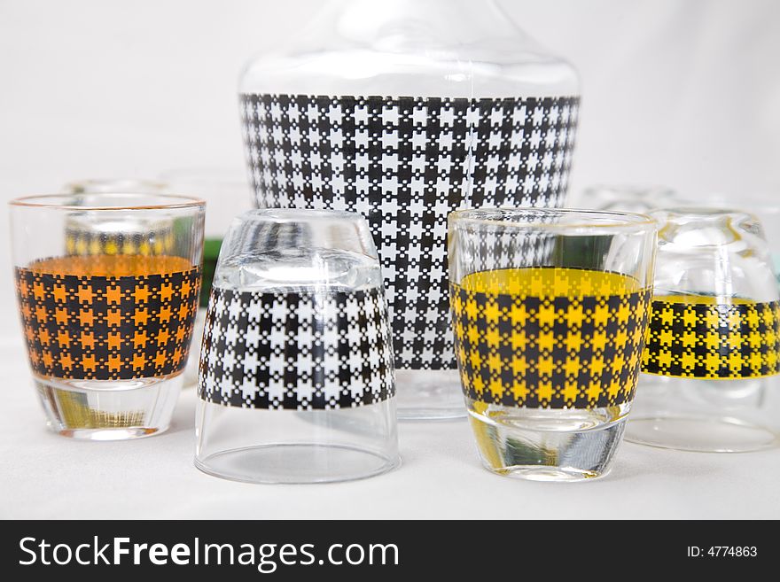 A set of shot glasses with colorful pattern. A set of shot glasses with colorful pattern