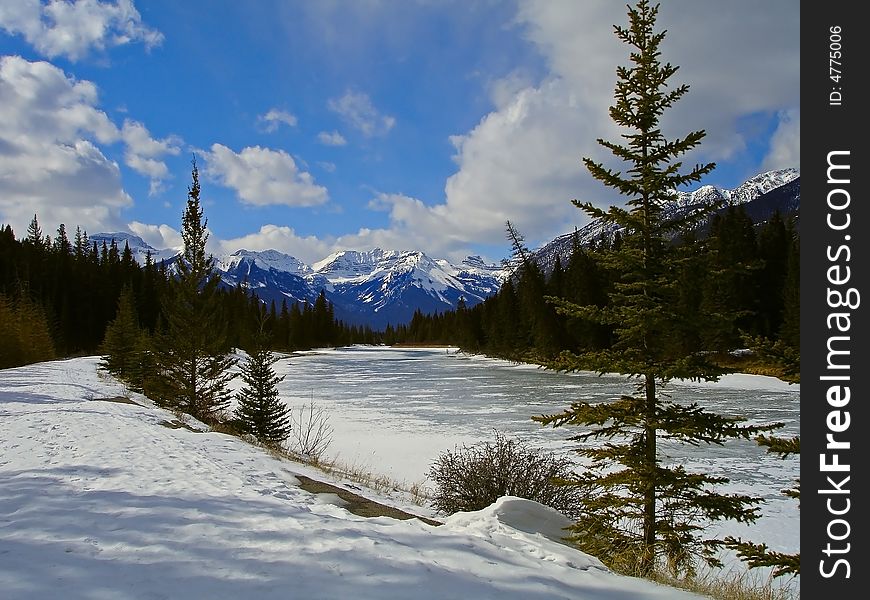 Canadian Rocky Mountains winter landscape with a river. Canadian Rocky Mountains winter landscape with a river