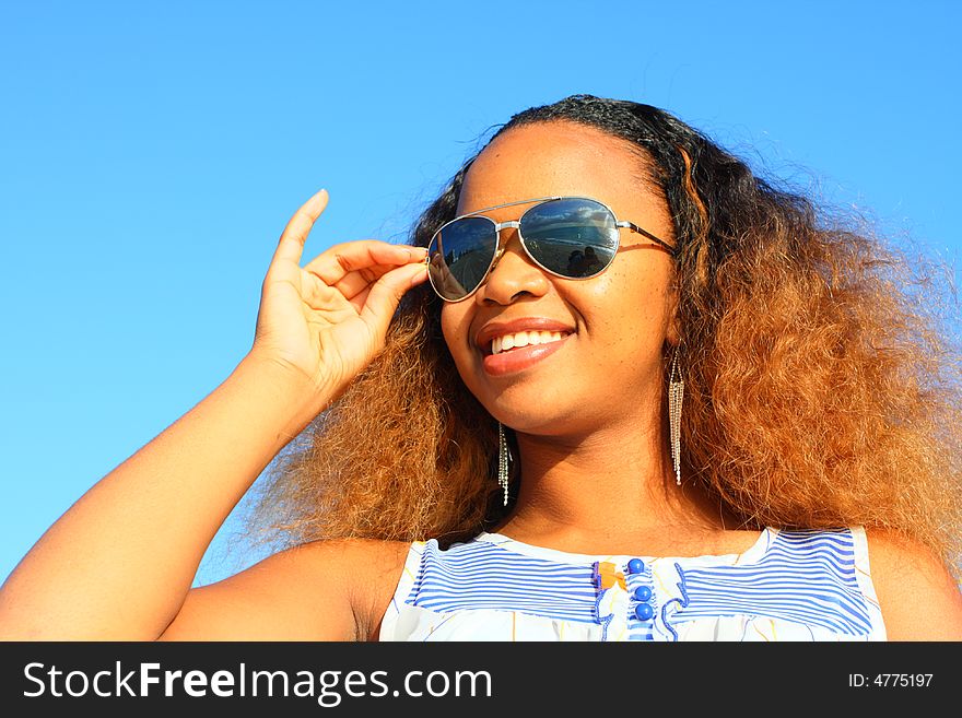 Woman Fixing Her Glasses