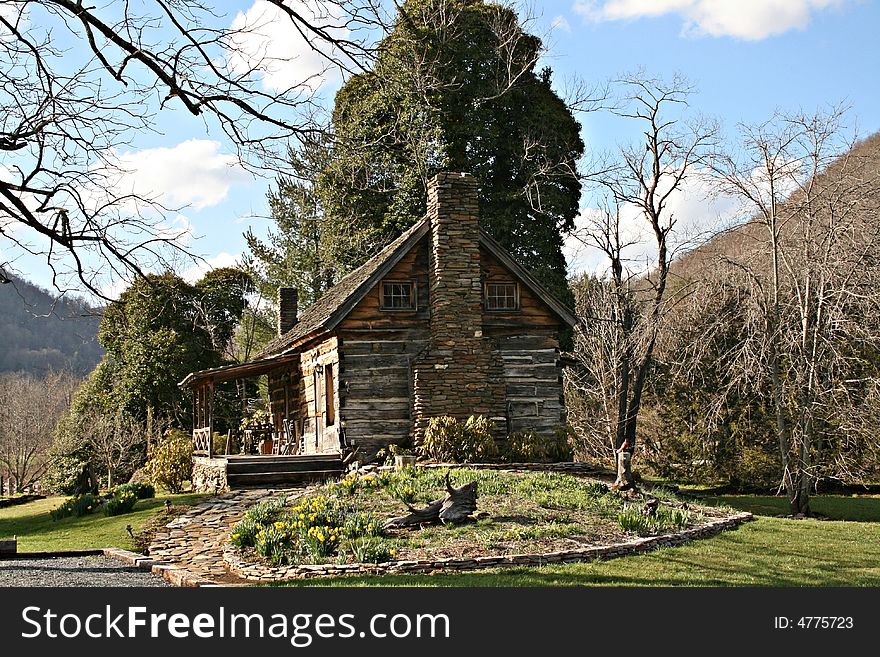 Log Cabin With Rock Chimney