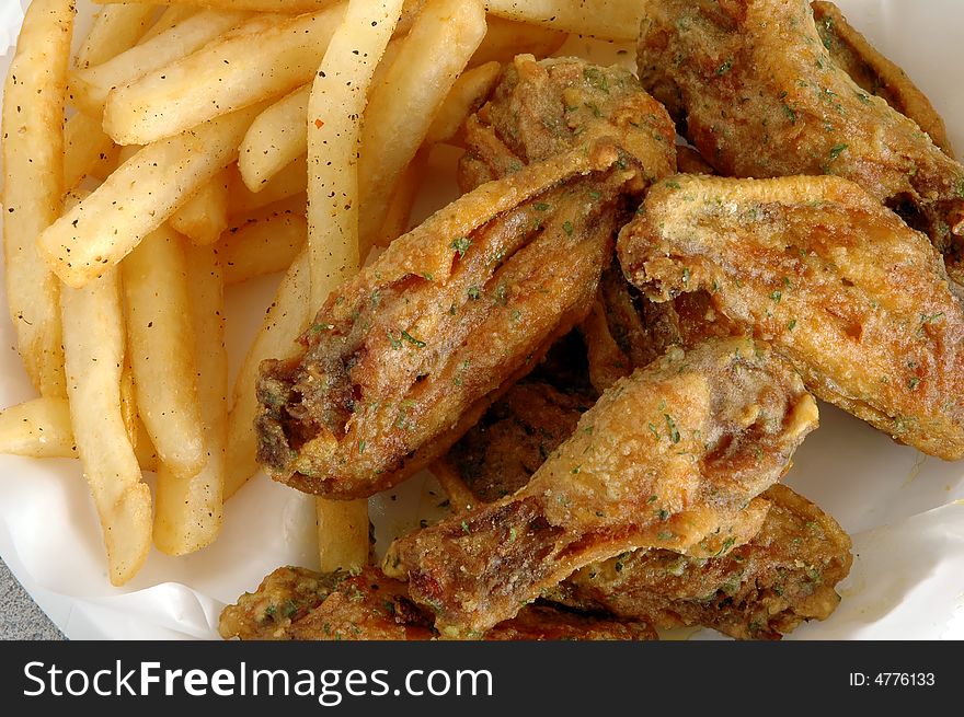 Lemon pepper wings with fries