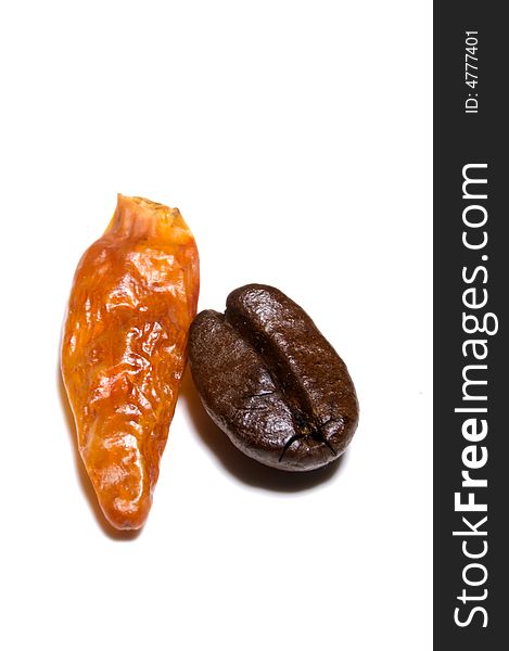 Isolated paprika and coffee bean. Isolated paprika and coffee bean