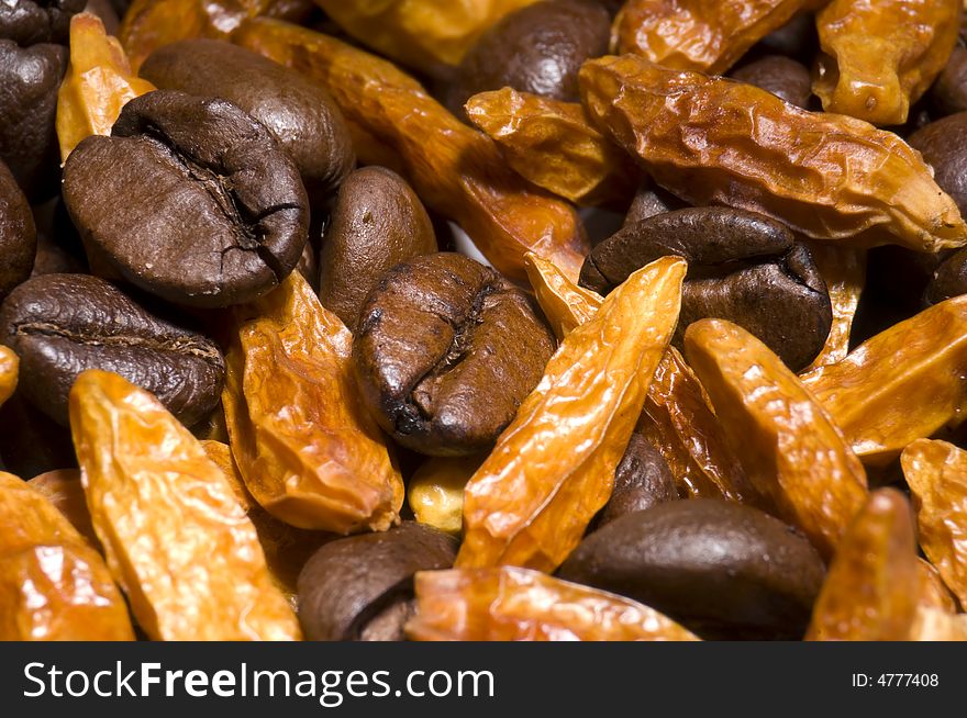 Spicy coffee background with hot chili and coffee beans