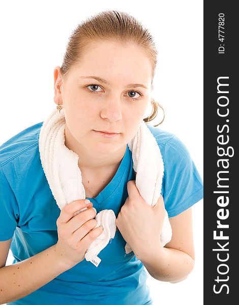 The young woman with the towel isolated on a white