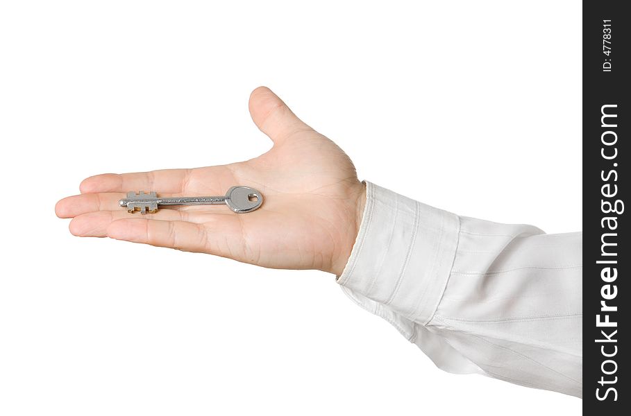 Businessman hand, holding key isolated on white