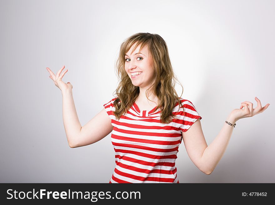 Smiling woman pointing something / copyspace /happy, beautiful, young girl