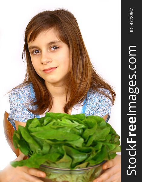 Girl eating a salad a over white background