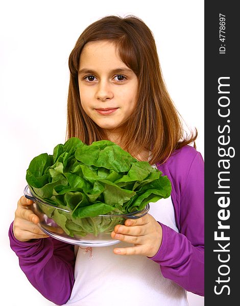 Girl eating a salad a over white background