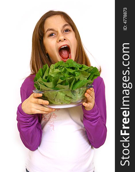 Girl eating a salad a over white background